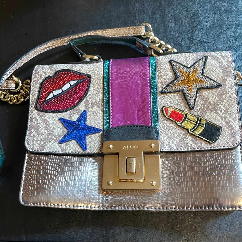 Aldo crossbody with unique & cool lips, lipstick, and stars appliqués